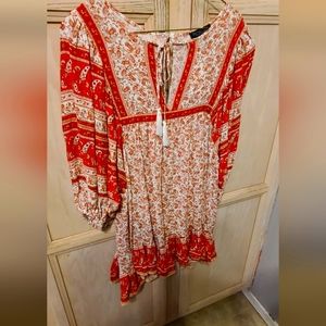 Fluttery coral and white bohemian top